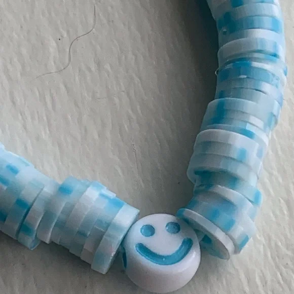 Handmade clay bead blue/white smile bead stretchy - Picture 2 of 4